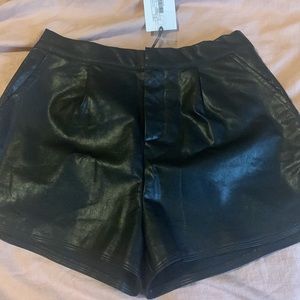 Mari High wasted faux leather shorts NWT
